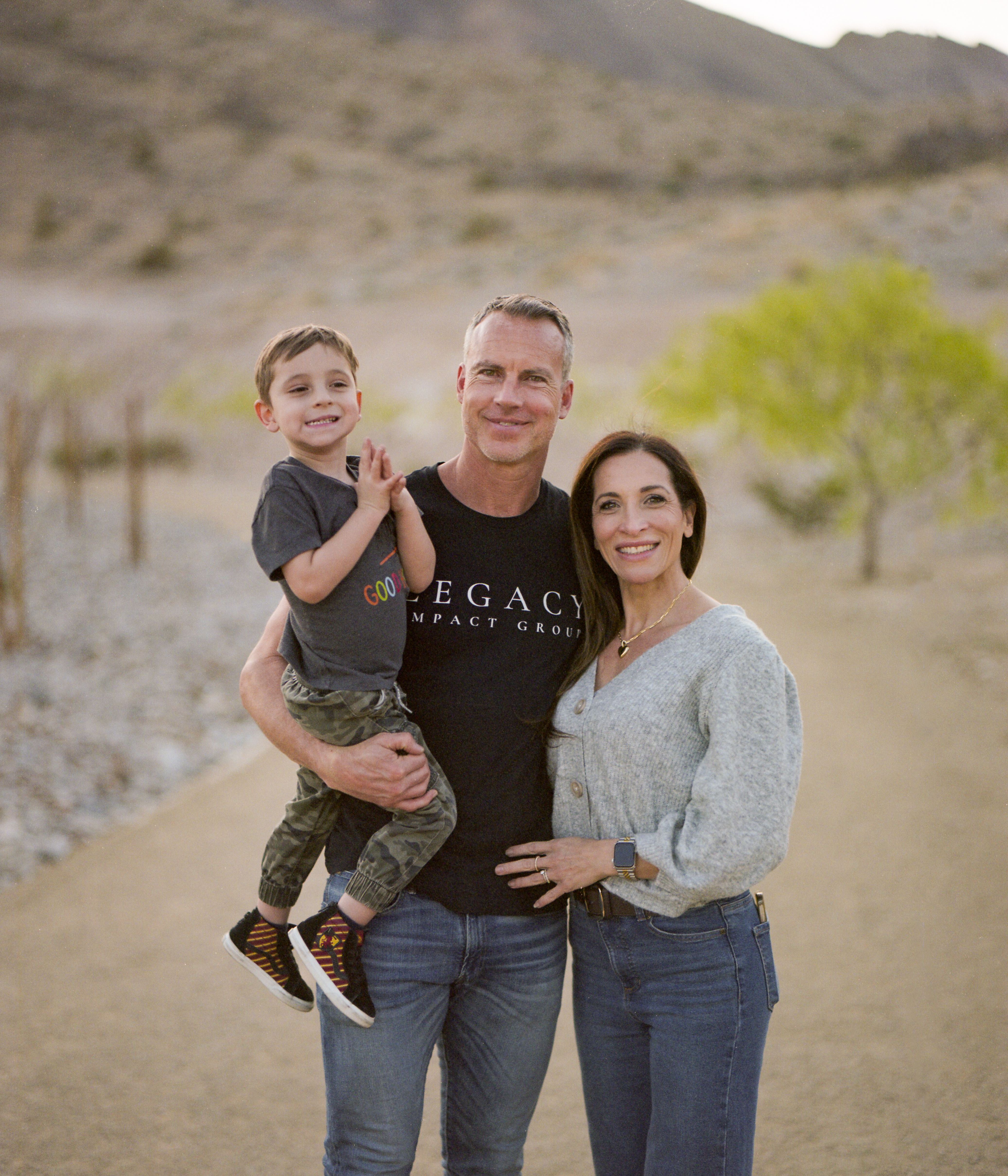 Adam Clausen, his wife Ro, and their son CJ